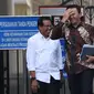 Komisaris Utama Pertamina Basuki Tjahaja Purnama tersenyum usai menemui Presiden Joko Widodo di Istana, Jakarta, Senin (9/12/2019). Pertemuan tersebut Presiden meminta agar memperbaiki defisit neraca perdagangan kita di sektor petrokimia dan migas. (Liputan6.com/Angga Yuniar)