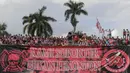 Madura United menyatukan empat kelompok suporter yang ada di Madura yaitu, K-Conk Mania, Trunojoyo Mania, Tharetan Mania dan Peccot Mania. (Bola.com/Vitalis Yogi Trisna)