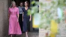 <p>Kate Middleton melengkapi penampilannya dengan sepatu cap-toe slingback pumps berwarna putih, juga dari rumah mode mewah tersebut. (Daniel Leal/Pool via AP)</p>