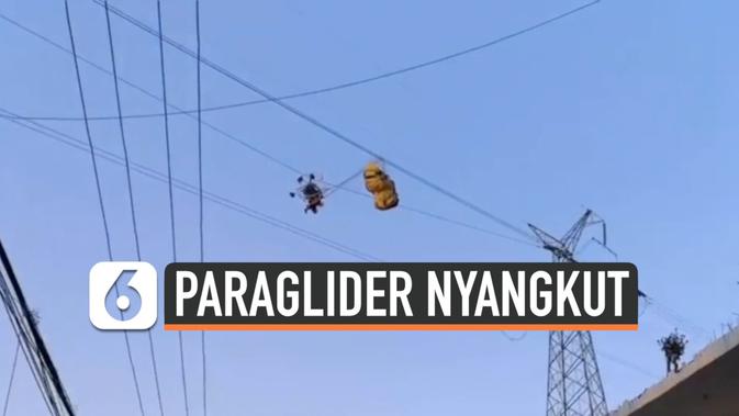 VIDEO: Paraglider Tersangkut Kabel Listrik Tegangan Tinggi Selama 4 Jam - Liputan6.com