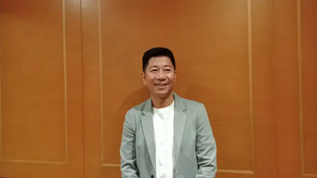 Direktur Enuma Indonesia - Juli Adrian
