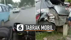 Mobil damkar yang hendak menyalip dari kanan bertemu minibus abu-abu yang menyeberang.