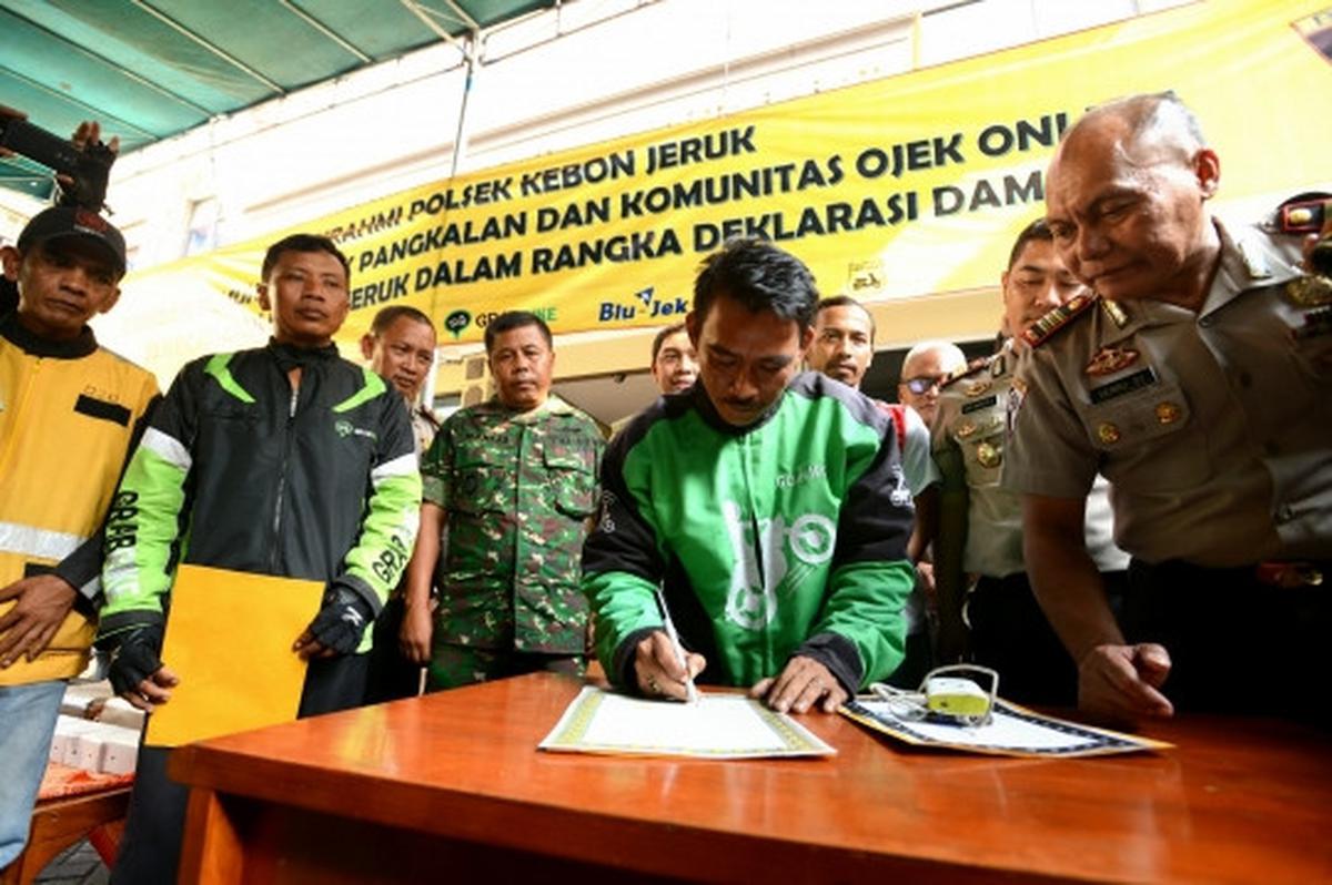 Ojek online dan pangkalan resmi berdamai