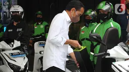 Pengukuhan komitmen dan kolaborasi akan memperluas uji coba komersial penggunaan kendaraan listrik roda dua yang akan terus dikembangkan secara bertahap hingga ribuan unit di sepanjang tahun 2022. (Liputan6.com/HO/Gojek)