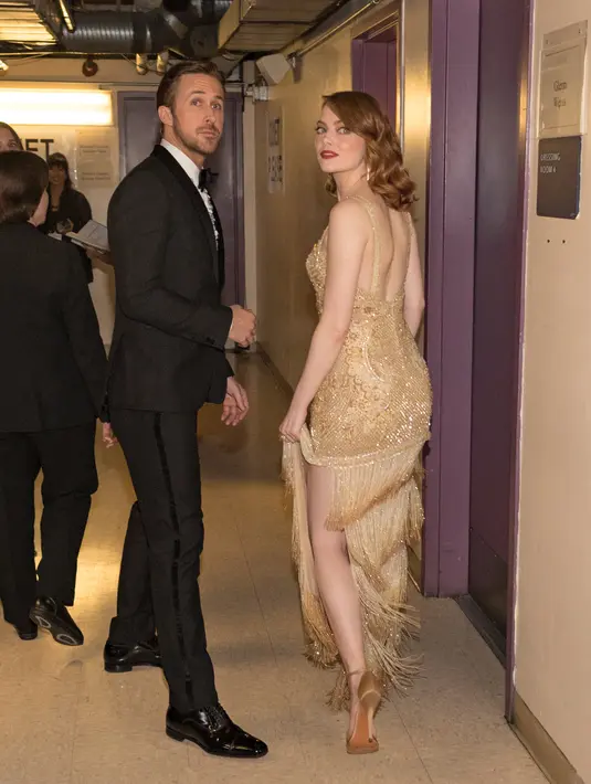 Sering beradu akting bersama, Emma Stone pun mencurahkan isi hatinya mengenai perasaan yang ia punya untuk Ryan Gosling. (CHRISTOPHER POLK / GETTY IMAGES NORTH AMERICA / AFP)