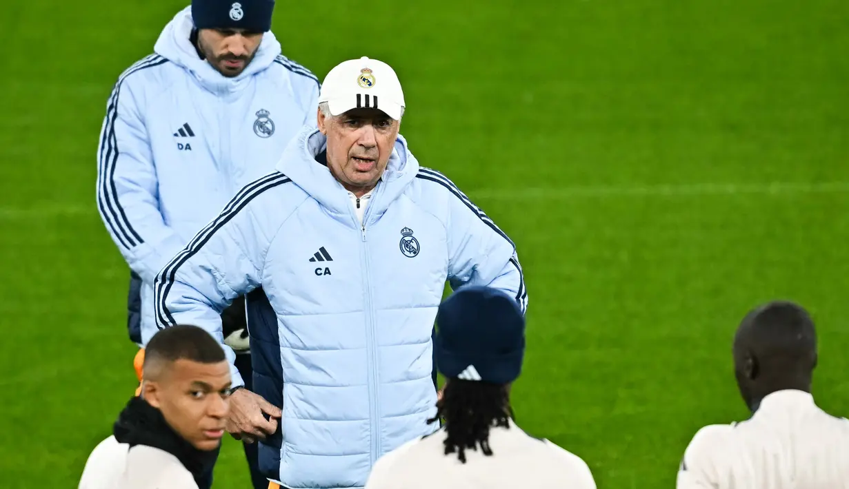 Laga tandang Real Madrid di markas Liverpool akan berlangsung pada Kamis 28 November 2024, pukul 03.00 dini hari WIB. (Paul ELLIS/AFP)