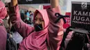 Aktivis Aliansi Gerakan Peduli Perempuan melakukan aksi bungkam menolak Penghapusan Kekerasan Seksual (PKS) saat CFD di kawasan Bundaran HI, Jakarta, Minggu (14/7/2019). RUU PKS dianggap masih bermakna rancu terkait budaya, agama, dan norma sosial di masyarakat. (Liputan6.com/Faizal Fanani)