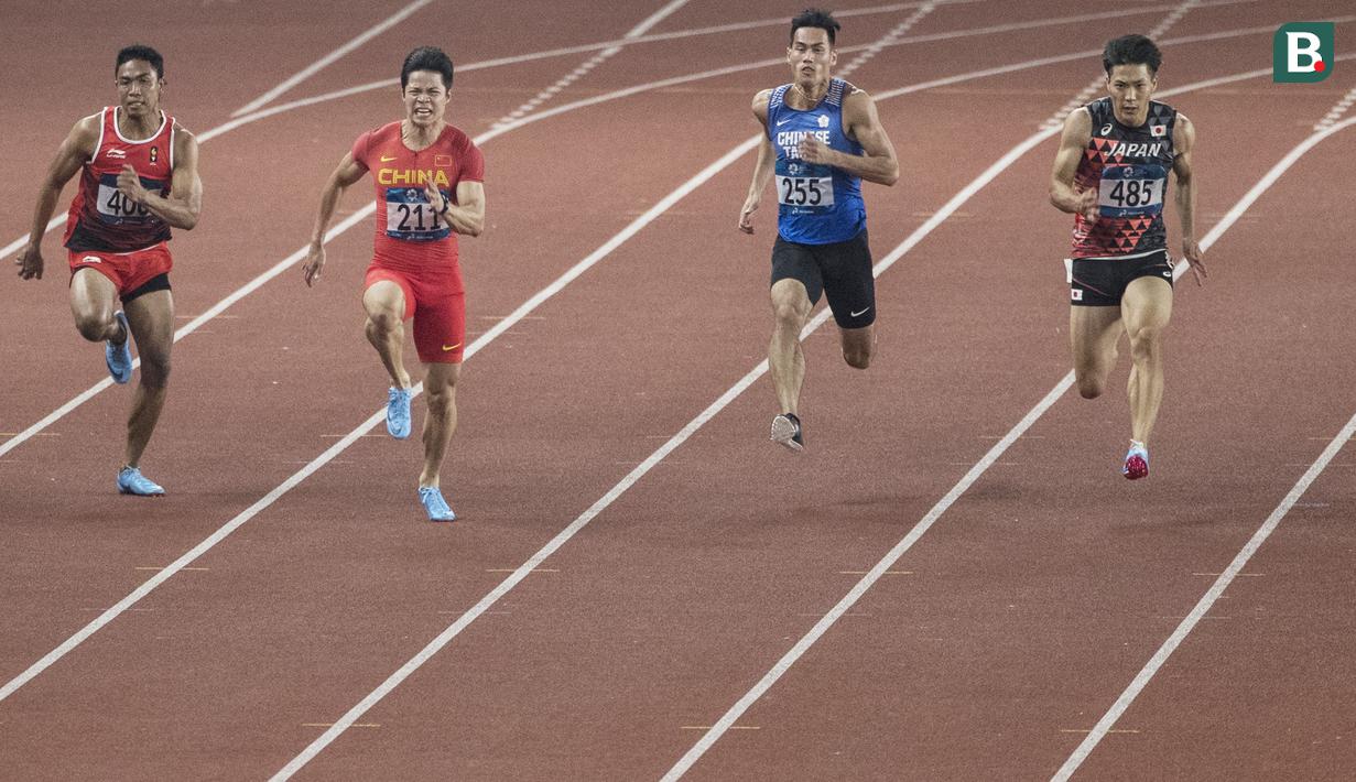 Pelari Indonesia, Lalu Muhammad Zohri, saat berlaga pada nomor 100 meter Asian Games di SUGBK, Jakarta, Minggu (26/8/2018). Lalu Zohri finish di urutan ke tujuh dengan catatan waktu 10,20 detik. (Bola.com/Vitalis Yogi Trisna)