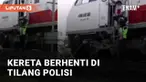 Sebuah momen langka terjadi ketika seorang petugas polisi menilang kereta api menarik perhatian