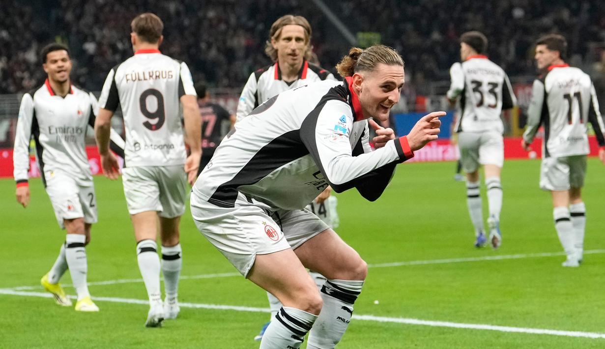 Dengan performa yang nyaris tanpa cela, Adrien Rabiot membuktikan dirinya sebagai motor permainan sekaligus penentu hasil akhir. Penampilan impresif ini tak hanya mengantar Milan meraih kemenangan, tetapi juga mempertegas perannya sebagai sosok vital di lini tengah Rossoneri. (AP Photo/Luca Bruno)