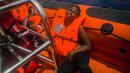 Seorang imigran Afrika sub-Sahara menangis usai diselamatkan dari atas perahu karet di tengah Laut Mediterania, lepas pantai Libya, Selasa (25/7). Di perahu karet itu, petugas penyelamat dari LSM Spanyol mememukan 13 mayat. (AP/Santi Palacios)