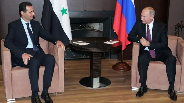 Presiden Rusia Vladimir Putin dan Presiden Suriah Bashar al-Assad