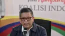 Sekretaris Tim Kampanye Nasional (TKN) Hasto Kristiyanto memberikan keterangan di Posko Cemara, Jakarta, Minggu (30/12). Dalam keteranganya Hasto menjelaskan isu-isu dan refleksi akhir tahun 2018. (Liputan6.com/Faizal Fanani)