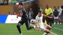 Tim racikan Xabi Alonso berhasil membungkam Salzburg tiga gol tanpa balas. (FRANCK FIFE/AFP)