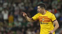 Robert Lewandowski mencetak dua gol dipertandingan ini.  (AP Photo/Alberto Saiz)