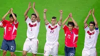 Partai ini pun dimenangkan oleh Turki dengan skor 3-2. Hakan Sukur dan kawan-kawan menduduki posisi ketiga dan Korea Selatan keempat di Piala Dunia 2002. (AFP/Greg Wood)