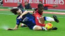 Wasit kembali memberikan hadiah penalti kepada Inter Milan pada menit ke-25, tepat setelah Fode Ballo-Toure melanggar Matteo Darmian. (AFP/Tiziana Fabi)