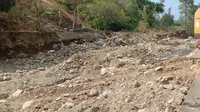 Bendungan Punaka rusak akibat banjir bandang. (Liputan6.com/Dionisius Wilibardus)