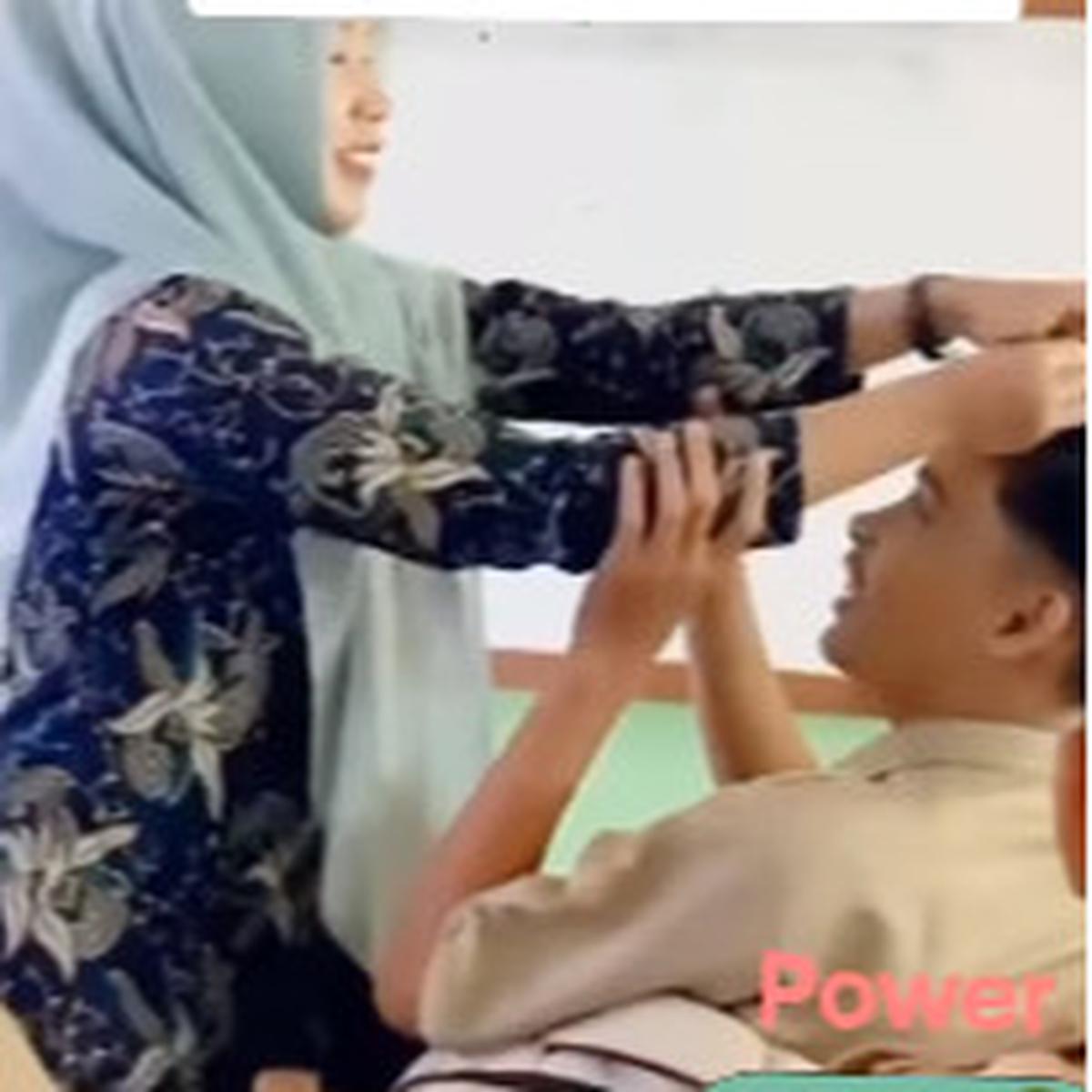 Bukan Dicukur, Ibu Guru Cantik ini Punya Cara Unik Beda Sendiri Hukum Siswa Berambut Gondrong