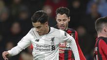 Gelandang Liverpool, Philippe Coutinho, menggiring bola saat pertandingan melawan AFC Bournemouth pada laga Premier League di Stadion The Vitality, Minggu (17/12/2017). Liverpool menang 4-0 atas AFC Bournemouth. (AP/Andrew Matthews)