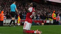 Winger Arsenal, Noni Madueke, berhasil menyumbangkan satu gol saat timnya membungkam Wigan Athletic pada pertandingan putaran keempat Piala FA 2025/2026 di Stadion Emirates, Senin (16/02/2026) malam WIB. (AP Photo/Maja Smiejkowska)
