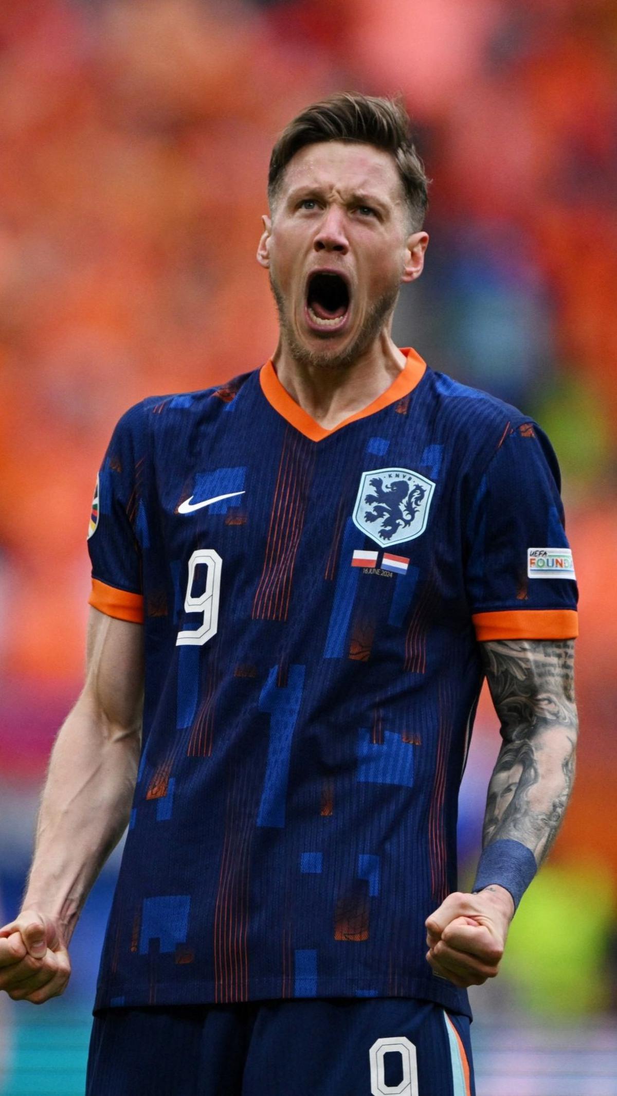 Aksi Pemain Belanda Wout Weghorst yang melakukan selebrasi saat merayakan gol kedua untuk timnya. Foto: Reuters