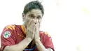 Reaksi kapten AS Roma, Francesco Totti di laga lawan Napoli yang berlangsung di Olimpico Stadium, 4 Oktober 2009. Dua gol Totti membuat Roma unggul 2-1. AFP PHOTO / Filippo MONTEFORTE 