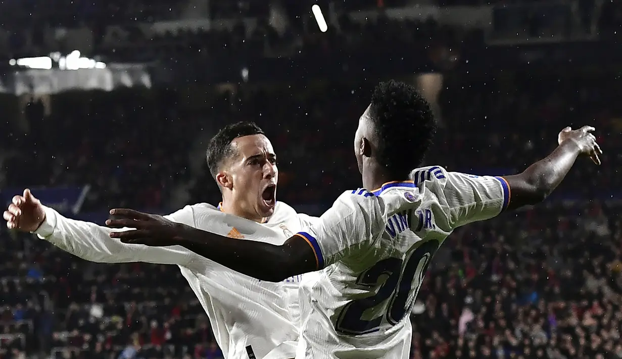 Real Madrid akhirnya mampu menambah satu gol lagi untuk unggul 3-1 sekaligus memastikan kemenangan lewat gol Lucas Vazquez di menit keenam masa injury time. (AP/Alvaro Barrientos)