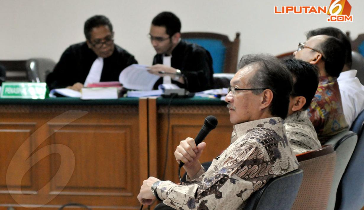 Deputi Gubernur BI, Halim Alamsyah hadir sebagai saksi dalam sidang lanjutan dugaan korupsi pemberian FPJP dan penetapan Bank Century sebagai bank gagal dengan terdakwa Budi Mulya, Senin (14/4/2014). (Liputan6.com/Johan Tallo)