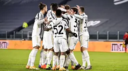 Pemain Juventus Dejan Kulusevski merayakan golnya ke gawang Genoa pada pertandingan babak 16 besar Coppa Italia di Allianz Stadium, Turin, Italia, Rabu (13/1/2021). Juventus melaju ke perempat final usai menaklukkan Genoa 3-2. (Marco Alpozzi/LaPresse via AP)