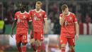 Pemain Bayern Munchen, Joshua Kimmich dan rekan-rekannya tampak lesu setelah ditaklukkan SC Freiburg dalam laga babak perempat final DFB Pokal di Allianz Arena, Rabu (05/04/2023). Bayern harus menelan pil pahit seteah dipermalukan tamunya SC Freiburg pada laga DFB Pokal. (AP Photo/Matthias Schrader)