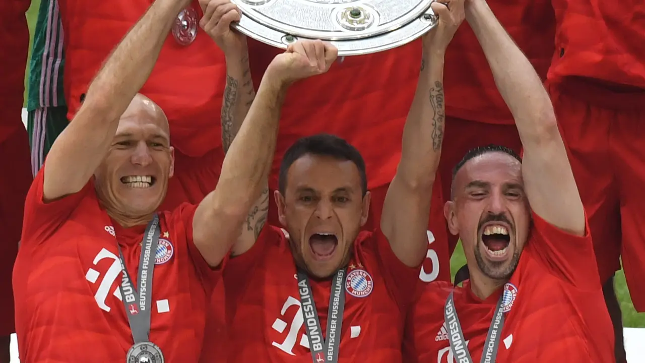 Tiga pemain Bayern Munchen, Arjen Robben, Rafinha, dan Franck Ribery.