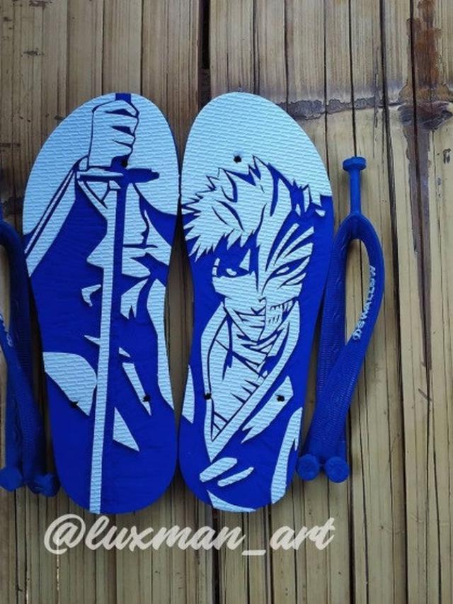Sandal jepit dengan ukiran keren (foto: Instagram/@luxman_art)