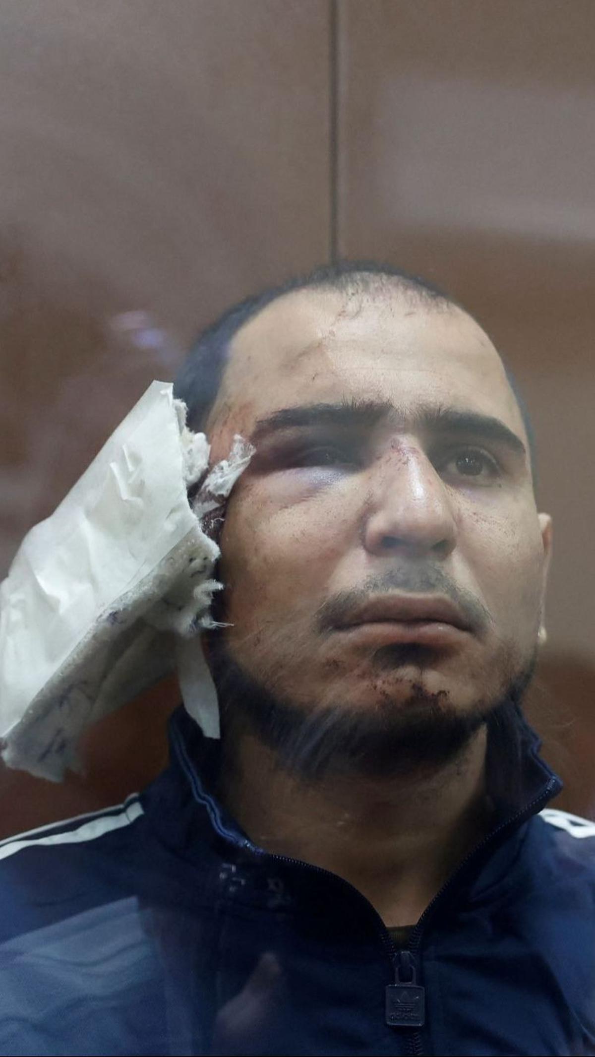 Saidakrami Murodali Rachabalizoda,&nbsp;tersangka penembakan di tempat konser Balai Kota Crocus, sebelum menjalani sidang di pengadilan distrik Basmanny di Moskow, Rusia. Foto: REUTERS / Yulia Morozova