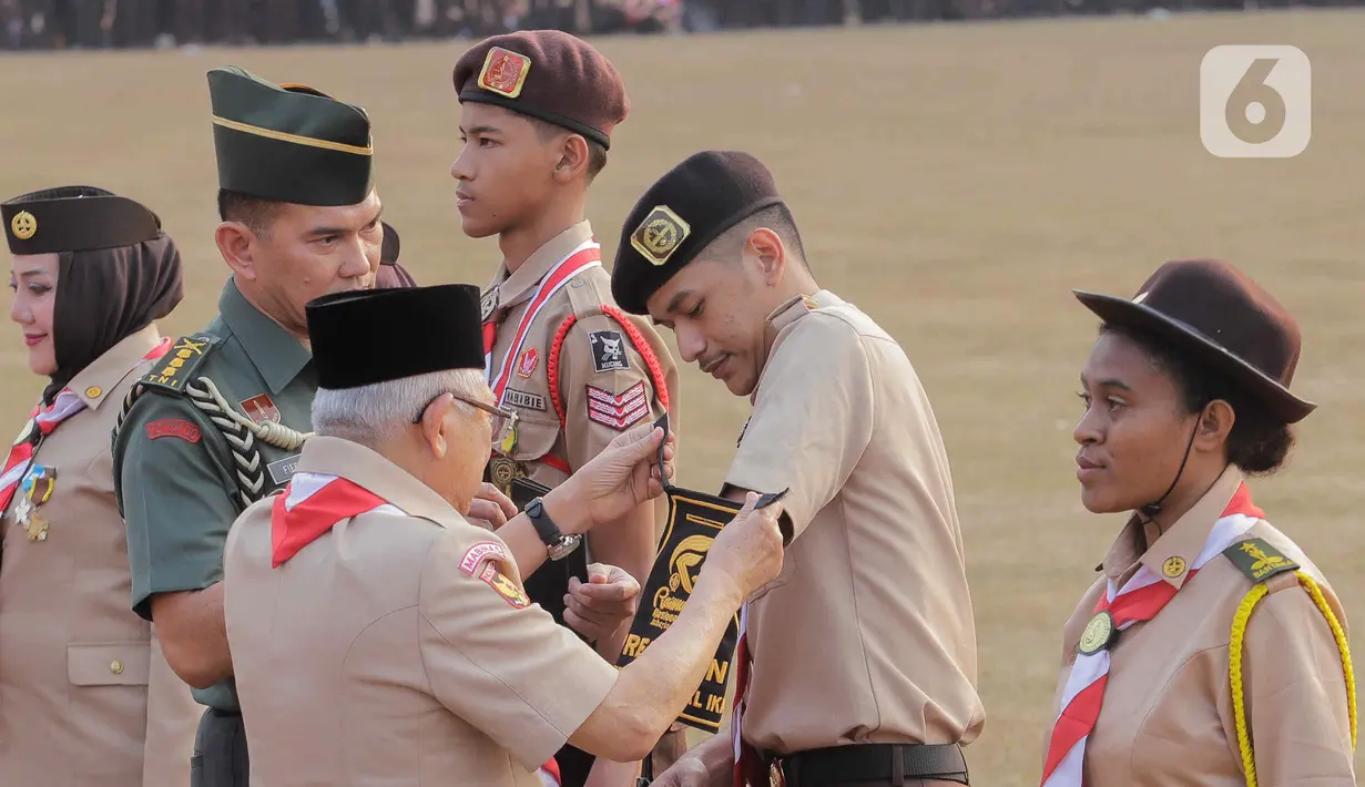 Wakil Presiden Ma’ruf Amin hadir sekaligus menjadi pembina upacara Peringatan Hari Pramuka ke-62 tahun. (Liputan6.com/Herman Zakharia)