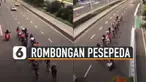 Terlihat rombongan pesepeda itu nampak melintas di tengah jalan jalur kendaraan bermotor.