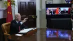Presiden Joe Biden melambai saat bertemu secara virtual dengan Presiden China Xi Jinping dari Ruang Roosevelt Gedung Putih di Washington, Senin (15/22/2021). Pertemuan dimaksudkan untuk menurunkan ketegangan antara AS dan China selaku dua negara adidaya dunia saat ini. (AP Photo/Susan Walsh)
