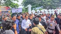 Anies Baswedan yang didampingi Racmat Gobel saat menyambangi Gorontalo (Arfandi Ibrahim/Liputan6.com)