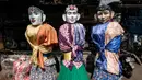 Ondel-ondel merupakan salah satu ikon yang ditetapkan berdasar Peraturan Gubernur DKI Jakarta Nomor 11 Tahun 2017 tentang Pelestarian Budaya Betawi. (Yasuyoshi CHIBA/AFP)