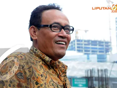 Anggota DPRD Banten, Kasmin kembali menjalani pemeriksaan oleh penyidik KPK. Jumat (11/4/2014) (Liputan6.com/Faisal R Syam).