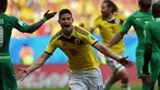 Selebrasi gelandang Kolombia, James Rodriguez, usai melesakkan bola ke gawang Pantai Gading  di laga penyisihan Piala Dunia 2014 Grup C di Stadion National Mane Garrincha, Brasil, (19/6/2014). (AFP PHOTO/Eitan Abramovich)