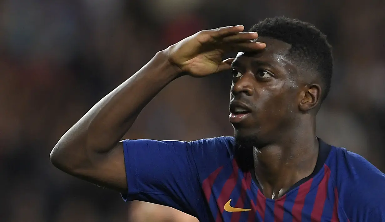 Ousmane Dembele merupakan pemain berkebangsaan Prancis yang direkrut Barcelona dari Borussia Dortmund pada bursa transfer musim panas 2017 dengan biaya 135 juta euro. Sayangnya, Dembele belum banyak memberikan kontribusi ke Blaugrana akibat sering mengalami cedera. (AFP/Lluis Gene)