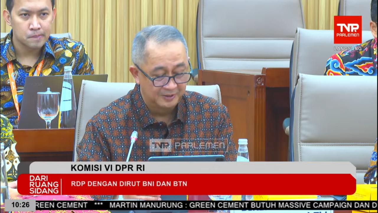 Direktur Utama PT Bank Negara Indonesia (Persero) Tbk, Royke Tumilaar saat Rapat Dengar Pendapat dengan Komisi VI DPR RI, Senin (8/7/2024). (Foto: tangkapan layar/Arief RH)