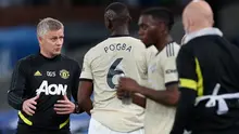 Pelatih Manchester United, Ole Gunnar Solskjaer, memberikan arahan kepada pemainnya saat menghadapi Crystal Palace pada laga lanjutan Premier League di Selhurst Park, Jumat (17/7/2020) dini hari WIB. Manchester United menang 2-0 atas Crystal Palace. (AFP/Peter Cziborra/pool)