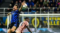 Laga Inter Milan melawan Torino berlangsung panas sejak menit awal. Il Toro harus bermain dengan 10 penggawa sejak menit ke-20 usai Guillermo Maripan diganjar kartu merah lantaran melanggar Marcus Thuram. (Piero CRUCIATTI/AFP)