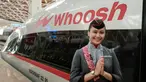 Seorang staf berpose setelah peresmian kereta cepat Jakarta-Bandung yang diberi nama 'Whoosh' di stasiun Halim, Jakarta, pada tanggal 2 Oktober 2023. (Yasuyoshi CHIBA/AFP)