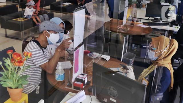 FOTO: LPS Jamin Simpanan Nasabah Sampai Rp 2 Miliar