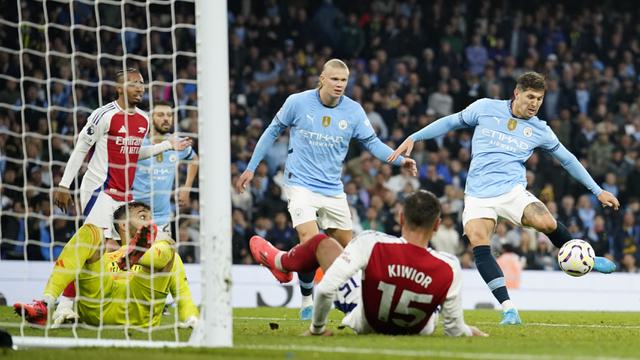 Foto: Melihat Gol Pamungkas John Stones yang Buyarkan Kemenangan di Depan Mata Arsenal Atas Manchester City