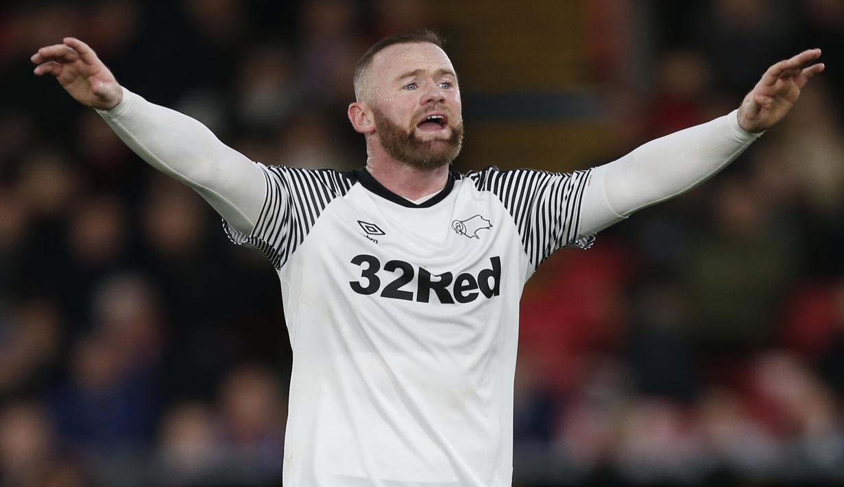 2. Wayne Rooney (208 gol) - Rooney merasakan puncak kariernya bersama Manchester United di kompetisi Premier League. Pemain berusia 34 tahun ini total telah menorehkan 208 gol di kompetisi Premier League. (AFP/Ian Kington)