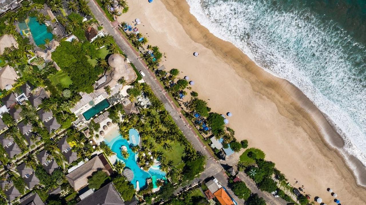 Pantai Kuta: Destinasi Tujuan Sunbathing<br>